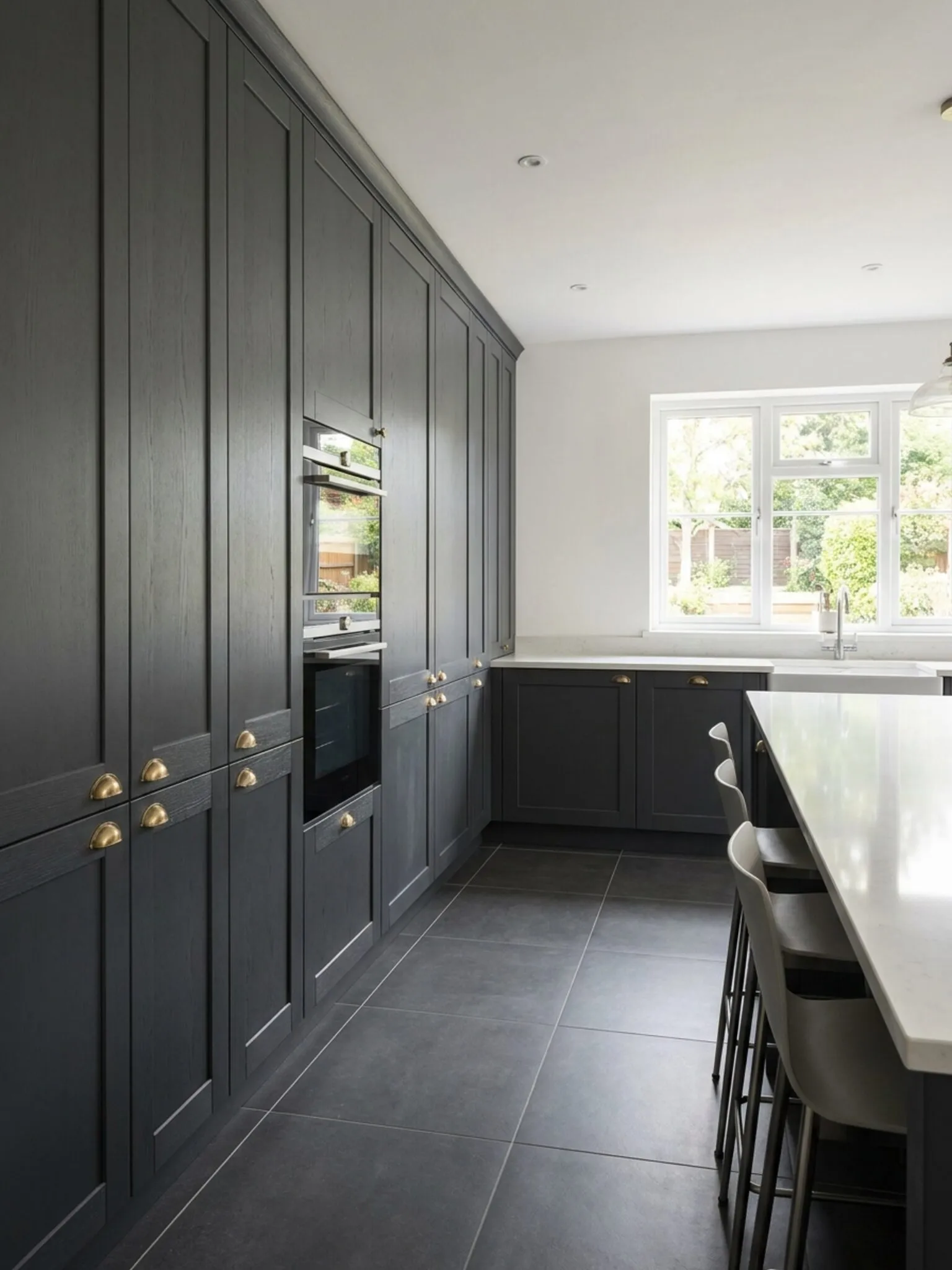 Bank of tall graphite units and anthracite porcelain floor