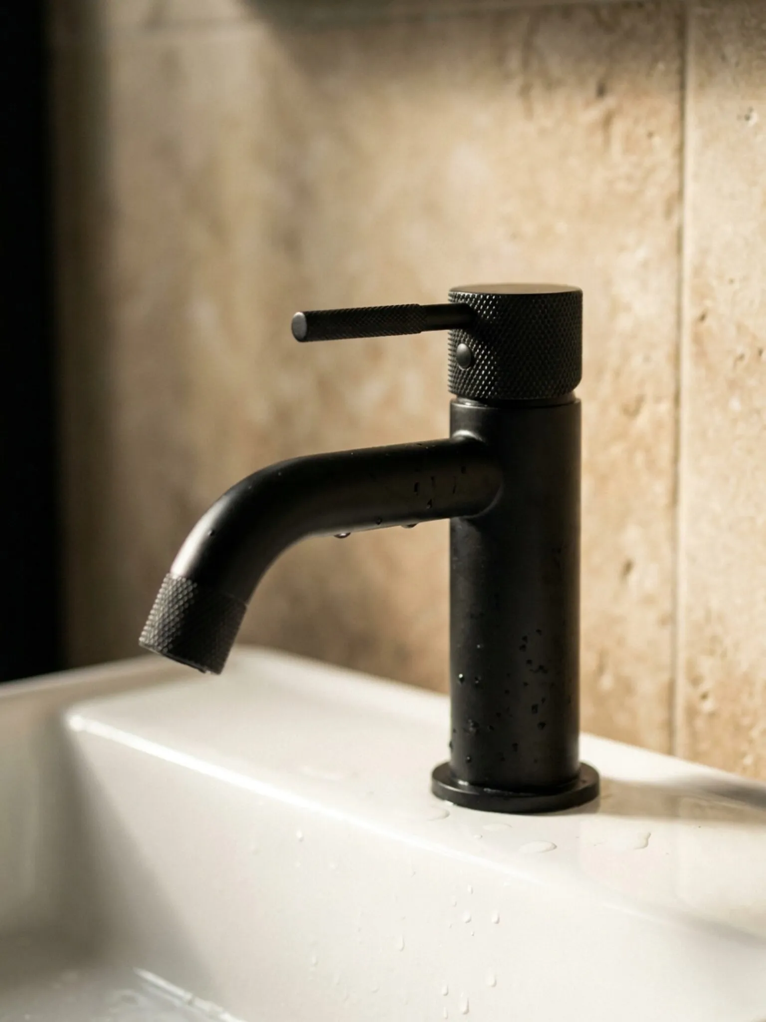 Matt black basin tap detail